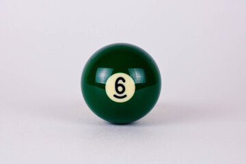 Shiny green ball number 6 for billiard isolated on white background