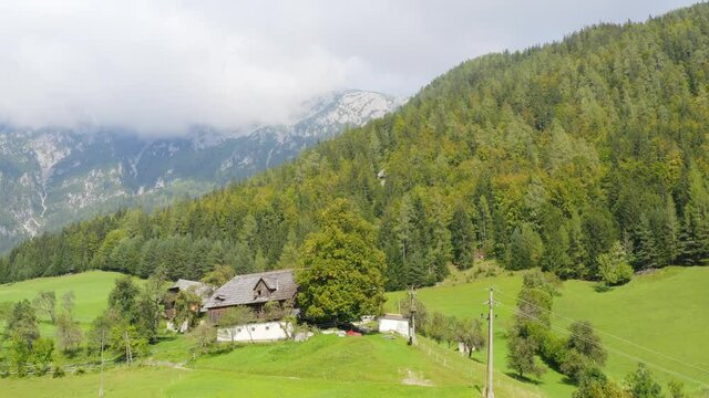 Chalet on clearing of picturesque Mount Peca  and Topla Valley, Alps