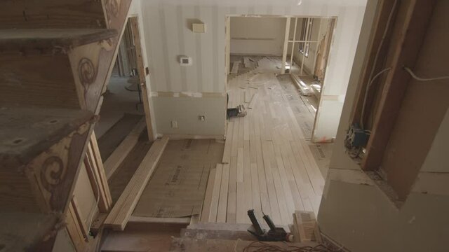 Time lapse of workers installing flooring