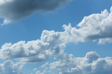 bright cumulus cloud and blue sky
