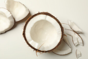Fresh tasty coconut on white background, top view