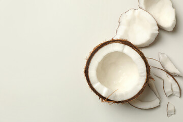 Fresh tasty coconut on white background, top view