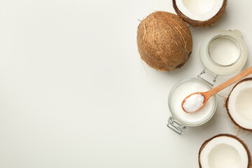 Fresh coconut and coconut milk on white background
