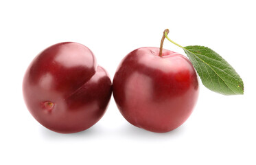 Fresh ripe plums isolated on white background