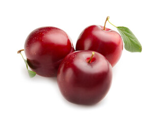 Fresh ripe plums isolated on white background