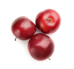 Fresh ripe plums isolated on white background