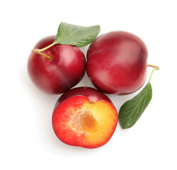 Fresh ripe plums isolated on white background