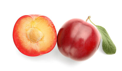 Fresh ripe plums isolated on white background