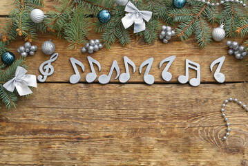 Obraz na płótnie Canvas Note signs and Christmas decor on wooden background