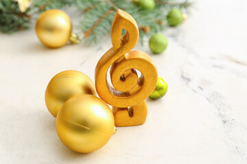 Violin clef and Christmas decor on light background