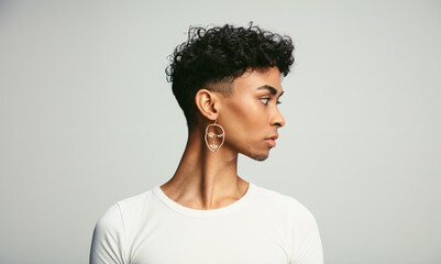 Androgynous male with earring