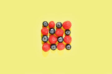 Fresh blueberries and raspberries studio shot