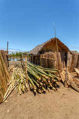 sale of firewood on street marketplace in Maroantsetra city, Madagascar. Madagascar has lost more than 90% of its original forest