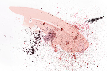 Beauty concept with abstract Smudged makeup foundation, broken shadows and sparkles on white...