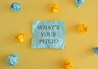 The words What's Your Pitch in red text on colored sticky note, a reminder to prepare your business...