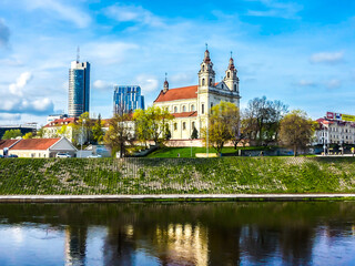 Fototapeta na wymiar Church of St. Raphael the Archangel and the Neris river in Vilnius, Lithuania 