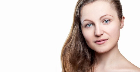 Fototapeta premium Portrait of pretty smiling woman with nude make up isolated on white background, copy space. Girl with clean healthy skin, beauty model.