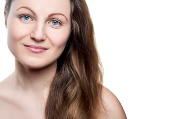 Fototapeta premium Portrait of pretty smiling woman with nude make up isolated on white background, copy space. Girl with clean healthy skin, beauty model.