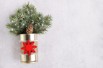 Winter composition, decoration, pine tree branches in vase on white background. Christmas, New Year, winter concept. copy space