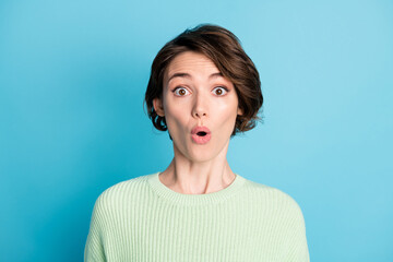 Portrait of nice impressed short hairdo girl open mouth wear lime sweater isolated on teal color background