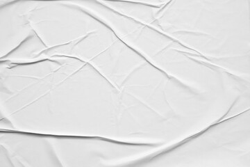 Blank white crumpled and creased paper poster texture background