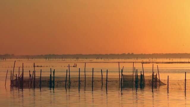 sunset over the po goro delta regional park