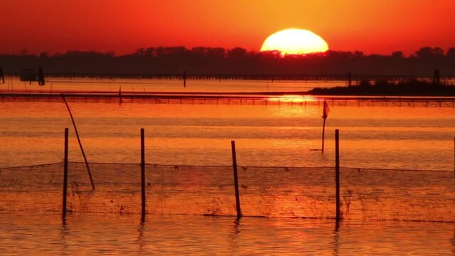 sunset over the po goro delta regional park