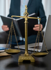 scales workplace lawyer office laptop document table