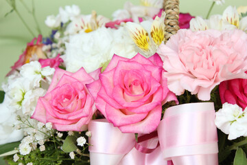 close up pink rose flower in another flower background. 