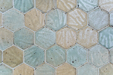 Vintage hexagonal mosaic ceramic tiles for texture background. Dirty hexagonal floor tiles in the form of honeycombs.
