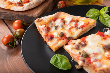 Pinsa romana, squisita variante della pizza italiana 