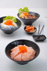 salmon donburi - japanese sliced salmon on rice bowl