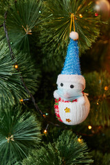 New Year's Christmas toy The snowman is protected by a mask from COVID-19