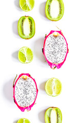 Tropical fruit design on white table background top view space for text