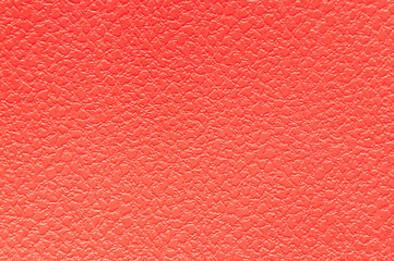 eco leather red background close-up