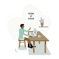 A businessman or manager in quarantine conducts
online videoconference. A remote worker in a shirt and underpants works on a laptop at home.