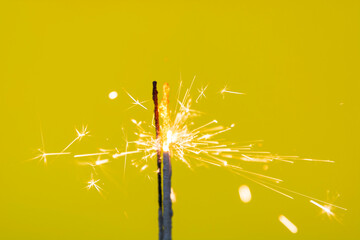 sparklers on a yellow background