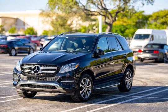 Miami, FL, USA - December 2, 2020: Black Mercedes SUV in a parking lot front quarter view