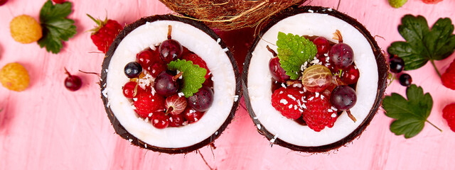 Banner of Fruit salad agrus, gooseberry, rasbberry in coconut