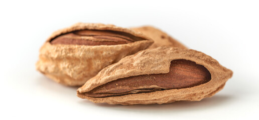 Almonds are the kernel of the nut was lying on a white background.Space for text