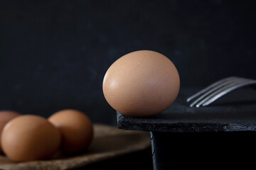 Egg presented on a slate plate
