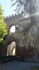 Ancient stone gate in the ancient Italian city