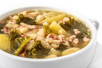 Creamy Tuscan soup in bowl isolated on white background. Close up