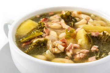 Creamy Tuscan soup in bowl isolated on white background. Close up