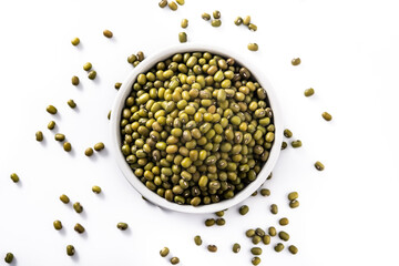 Green soy beans in white bowl isolated on white background. Top view