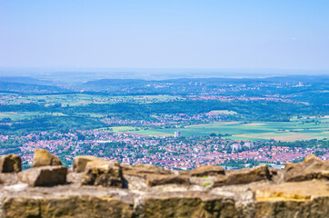 Fototapeta premium Surroundings of Reutlingen, Baden-Württemberg, Germany - View from the Achalm castle ruin over the surroundings of Reutlingen, Baden-Württemberg, Germany.