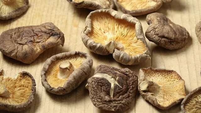 Group of dried whole shiitake mushrooms close up