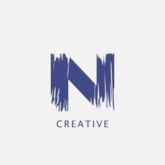 Letter N Abstract Brush Stroke Logo design. Classy monogram Paint Logo Letter Icon with Elegant brush shape Design.