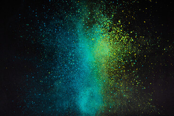 Explosion of colour powder isolated on black background. Abstract colour background
