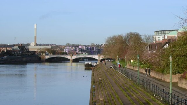 Nottingham, England- December 03, 2020: The famous Trent Bridge over the river with the Nottingham Forest City Ground in the background